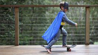 A young boy on a skateboard